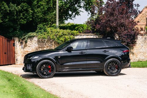 Lister Stealth — Side profile at the gates