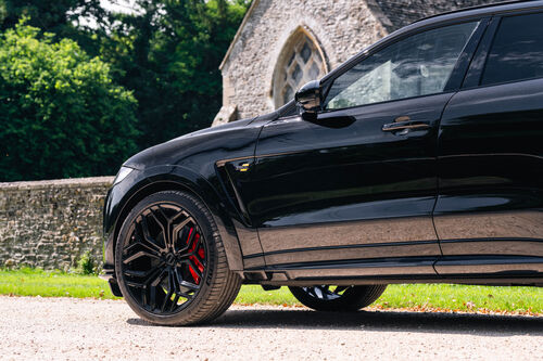 Lister Stealth — Low side against the churchyard wall