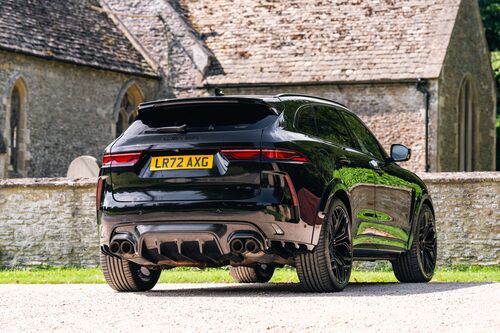 Lister Stealth — Rear three-quarter with the church